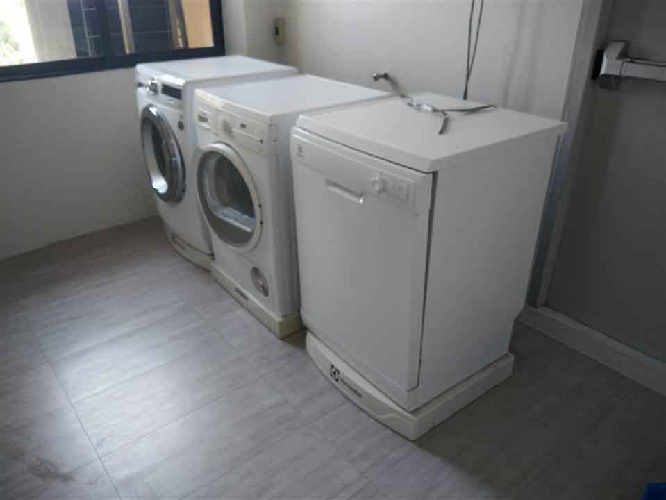 LAUNDRY ROOM AT UNIT 3RD FLOOR